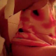 A hidden camera is set up on the floor beside a toilet and records an unsuspecting brunette girl wearing glasses taking a shit and then wiping herself. A fart, a few plops, and some peeing can be heard. This appears to be genuine voyeur material.